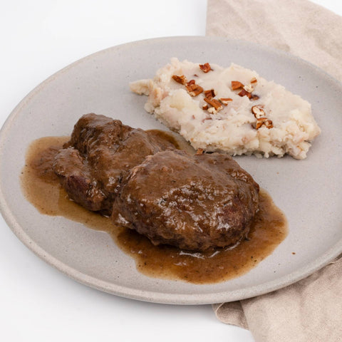 Guiso de carrilleras con vino tinto y puré rústico